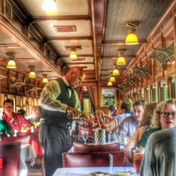 Eureka Springs & North Arkansas Railway inside train car people having lunch