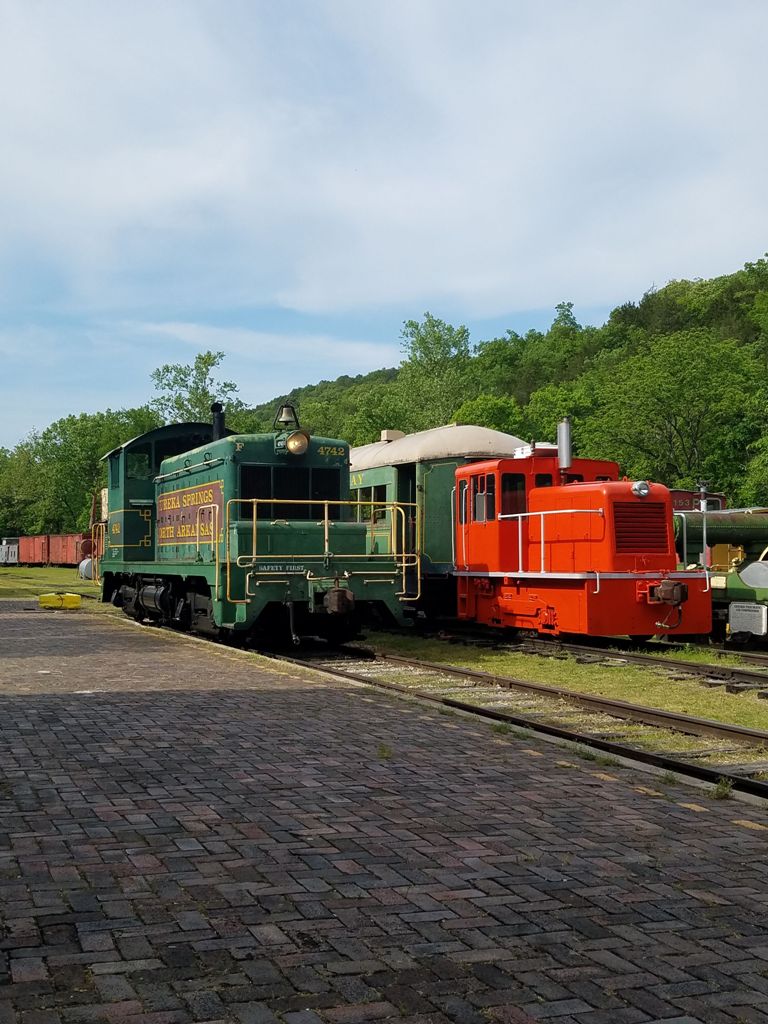 Eureka Springs & North Arkansas Railway red and green rain cars