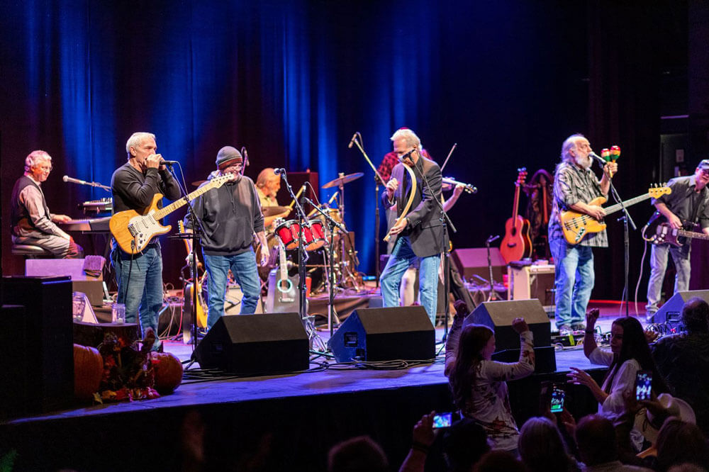 a band on stage at The Aud