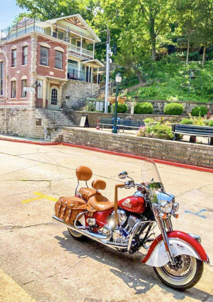 motorcycle parked in front of Basin Hotel