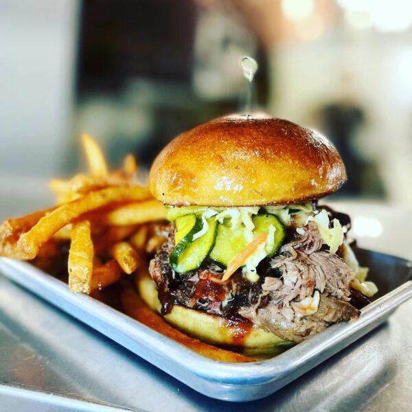 pulled pork sandwich with french fries